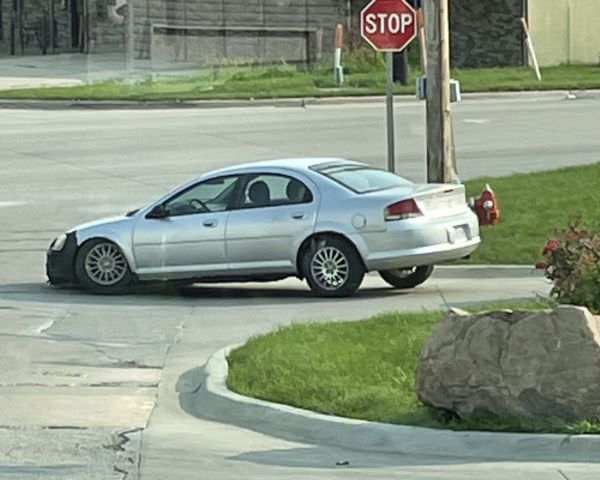 car at stop sign