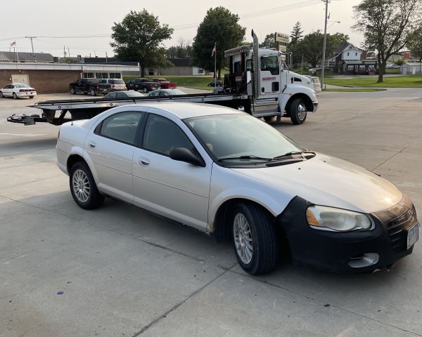 Gray car in parking lot