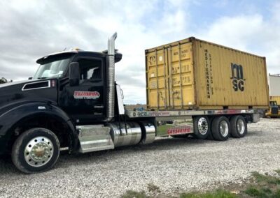 Container on flatbed truck