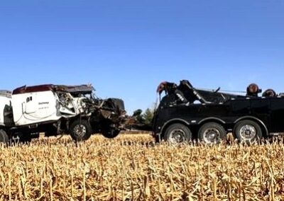 Heavy duty tow truck towing semi tractor trailer