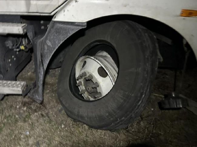 Truck tire off of rim