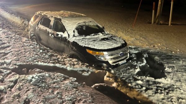 Car in Deep Snow