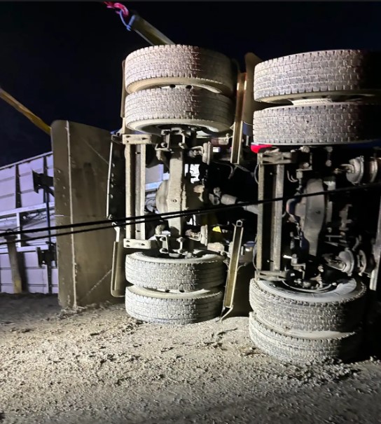 8-wheels of an overturned semi