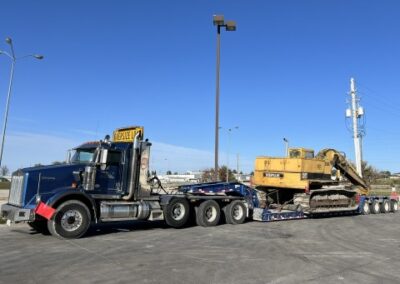 Cat construction equipment on a trailer