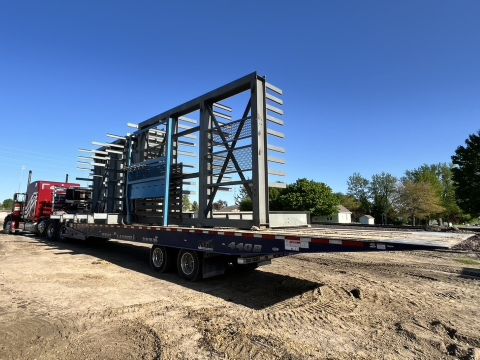 Transporting Large Equipment Large piece of equipment on a trailer